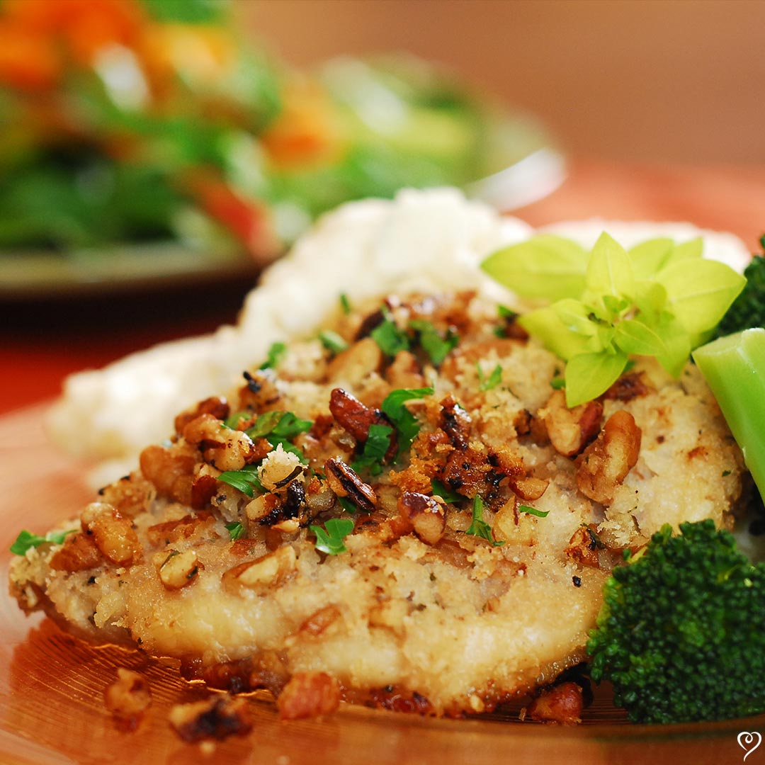 Pecan Crusted Pork Chops with Creamy Herbed Peas